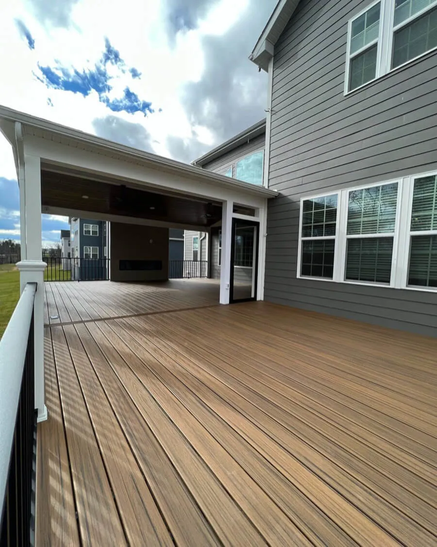 Covered backyard deck with a finished, weather-sealed surface