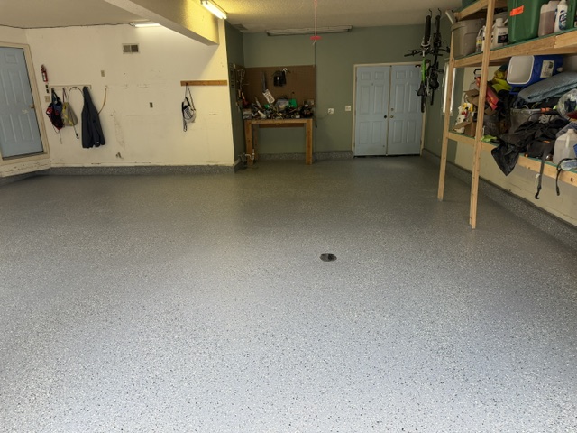 Working garage floor epoxy in Kansas City by Surface Shield