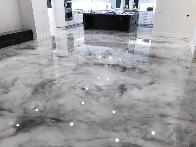 Grey and white metallic marble epoxy floor in an open-plan kitchen